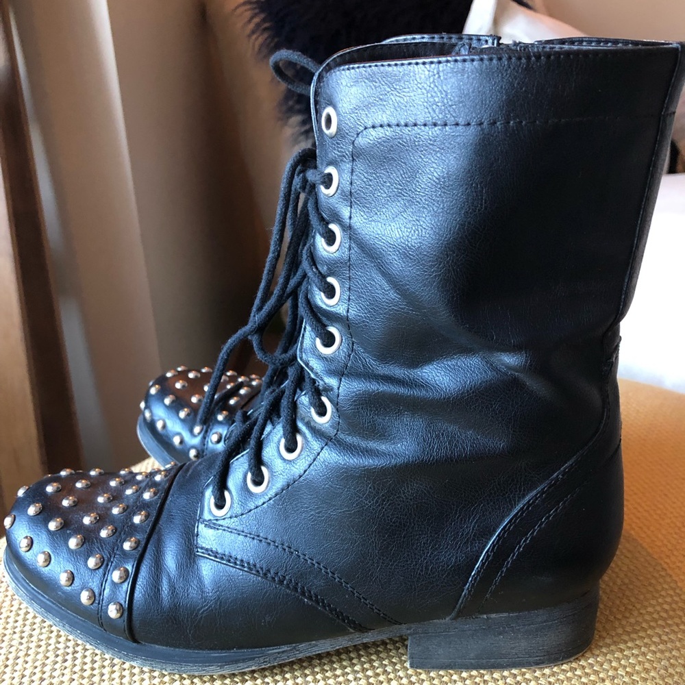 Black combat boots with studded design on front of boot. Gently worn.